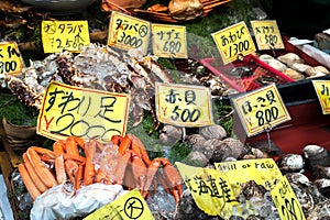 Fresh seafood on sale at Kuromon Ichiba Market in Osaka, Japan