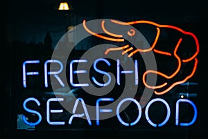 Fresh Seafood sign in Fells Point, Baltimore, Maryland. photo