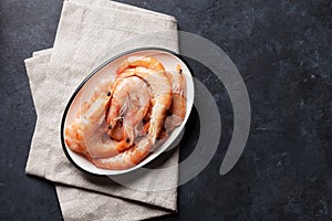 Fresh seafood on stone table. Shrimps