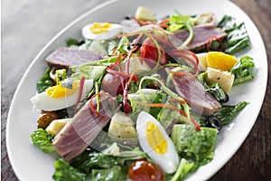 Fresh seared raw tuna mixed vegetable salad with mustard sauce