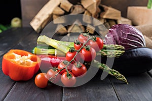 Fresh seasonal vegetables on rustic wooden table