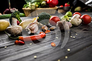 Fresh seasonal vegetables on wooden table background