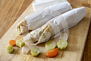 Fresh shawarma sandwiches with vegetables and pickles ready to eat, arabic food