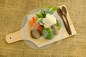 Fresh shitake mushroom,broccoli and green pea on wooden board