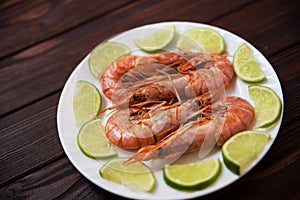 Fresh Shrimp with green salad on wooden backgrownd. Healthy food