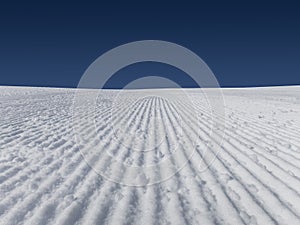 Fresh ski slopes early morning