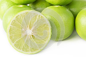 Fresh slice lime isolated on white background.
