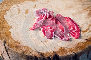 Fresh sliced beef hind shank on chopping board