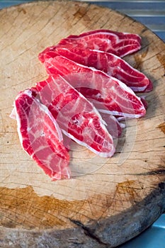 Fresh sliced beef hind shank on chopping board