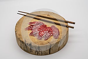 Fresh sliced beef hind shank on chopping board