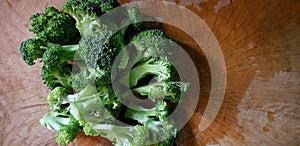 Fresh sliced of broccoli on wooden with right copy space for cooking food