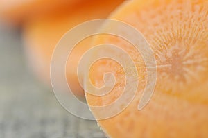 Fresh sliced carrot on wooden, decorate