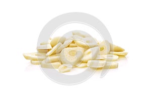 Fresh sliced garlic isolated on white background