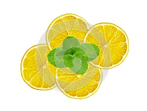 Fresh slices lemon with leaf mint isolated on white