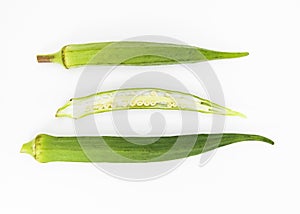 fresh slices and whole of okra or Lady Finger over on white background, top view