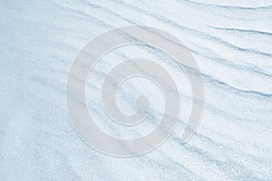 Fresh snow background texture. Winter background with snowflakes and snow mounds. Snow lumps