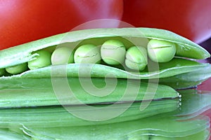 Fresh snow peas in a pod close-up. A colorful abstract photo
