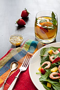 Fresh spinach fruit salad.