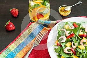 Fresh spinach fruit salad.