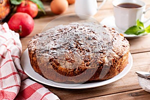 Fresh sponge cake with apples. Chiffon biscuit on table