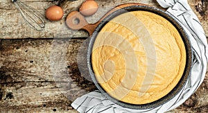 Fresh sponge cake biscuit on wooden background. Bakery background concept. banner, menu recipe place for text, top view