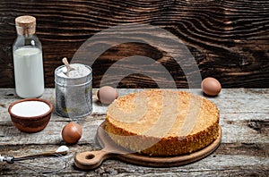 Fresh sponge cake biscuit on wooden background. Bakery background concept. banner, menu recipe place for text, top view