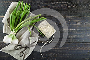 Fresh spring onions and old scissors