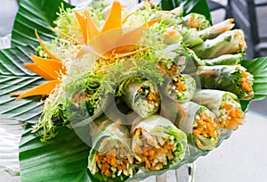 Fresh spring rolls with vegetables and rice papers. Vietnamese cuisine for health, diet and vegan