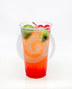 Fresh Squeezed cherry limeade on a white background.