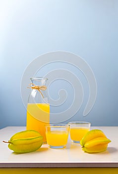 Fresh squeezed star fruit juice on the table