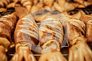 Fresh squid grilled over charcoal fire for sale at Ban Na Kluea Seafood Market