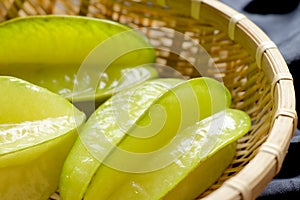 Fresh star fruit. Carambola in bamboo basket.Healthy food.