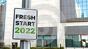 Fresh Start 2022 sign in downtown city setting