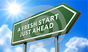 A Fresh Start Green Road Sign Against Clouds and Sunburst