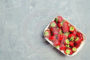 Fresh strawberries in a basket, red berry, only from a garden bed. sweet harvest. space for text. summer berry. copyspace