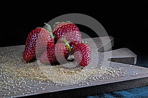 Fresh strawberries and brown sugar photo