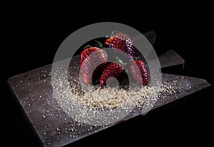 Fresh strawberries and brown sugar photo