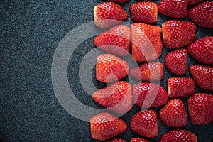 Fresh strawberries halves symetrical background