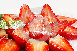 Fresh strawberries with icing sugar