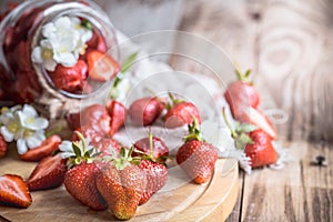 Fresh strawberries in jars