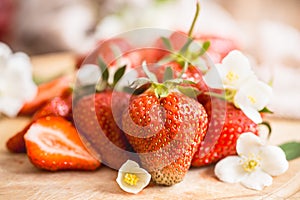 Fresh strawberries in jars