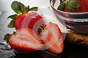 Fresh strawberries juicy on wooden table on a kitchen photo