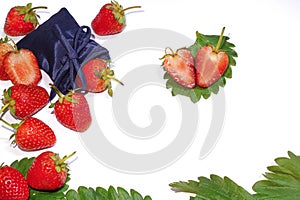 Fresh strawberries on leaf.