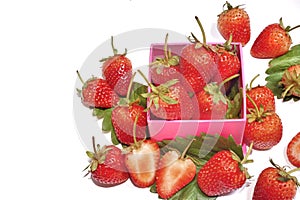 Fresh strawberries on pink box.