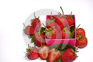 Fresh strawberries on pink box.