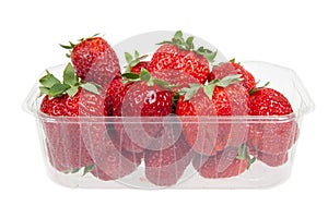 Fresh strawberries in plastic box, isolated