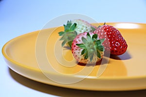 Fresh strawberries on the plate