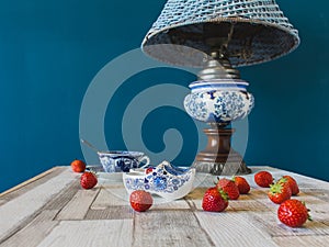 Fresh strawberries and typical Dutch Delfts blue crockery and so