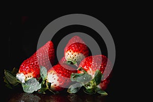 Fresh strawberries with water drops.
