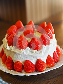 Fresh strawberries and whipped cream sponge cake